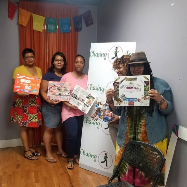 Chasing Joy Vision Board Party group shot with 5 women attendees and their completed vision boards. 